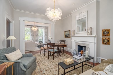 This beautifully renovated c.1852 brick townhome overlooking - photo 13