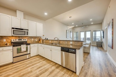 Discover the ultimate retreat in this updated Penthouse-level - photo 15