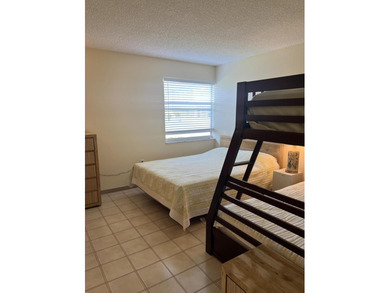 Welcome to this charming 2-bedroom, 2-bathroom condo located on - photo 15
