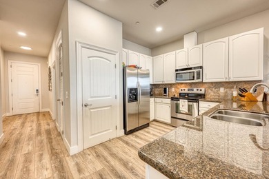 Discover the ultimate retreat in this updated Penthouse-level - photo 16