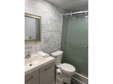 Welcome to this charming 2-bedroom, 2-bathroom condo located on - photo 16