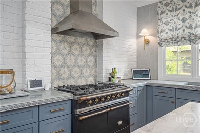 This beautifully renovated c.1852 brick townhome overlooking - photo 22