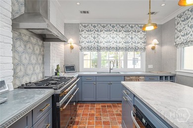 This beautifully renovated c.1852 brick townhome overlooking - photo 23