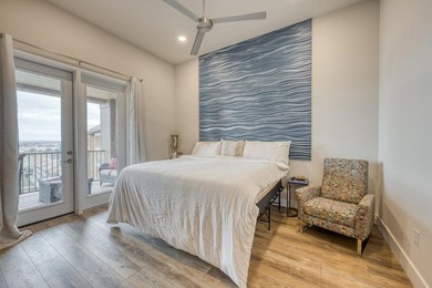 Discover the ultimate retreat in this updated Penthouse-level - photo 26