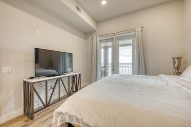 Discover the ultimate retreat in this updated Penthouse-level - photo 27
