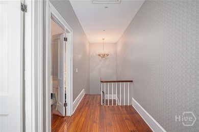 This beautifully renovated c.1852 brick townhome overlooking - photo 29
