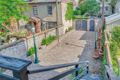 This beautifully renovated c.1852 brick townhome overlooking - photo 42