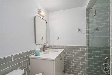 This beautifully renovated c.1852 brick townhome overlooking - photo 49