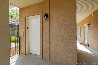 Experience low-maintenance lake living in this well-maintained - photo 2