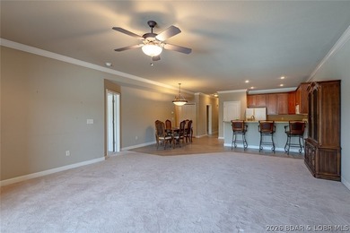 Experience low-maintenance lake living in this well-maintained - photo 5