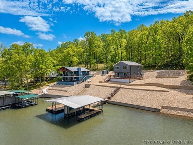 Cove location with 100 feet of lakefront, this beautifully - photo 1
