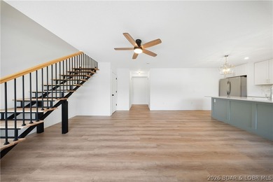 Cove location with 100 feet of lakefront, this beautifully - photo 3