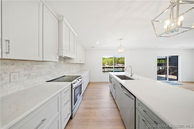 Cove location with 100 feet of lakefront, this beautifully - photo 9