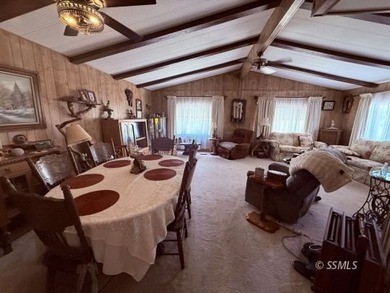This inviting 1984 manufactured home, set on a permanent - photo 13