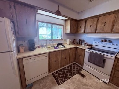 This inviting 1984 manufactured home, set on a permanent - photo 16