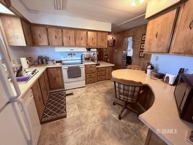 This inviting 1984 manufactured home, set on a permanent - photo 18