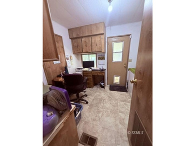This inviting 1984 manufactured home, set on a permanent - photo 22