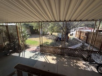 This inviting 1984 manufactured home, set on a permanent - photo 45
