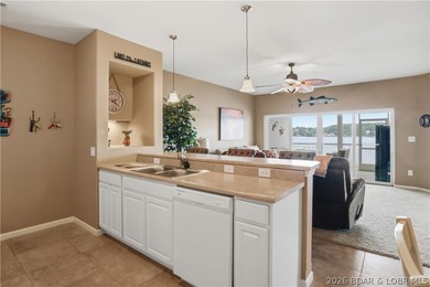 Experience elevated lake living in this rare lakefront condo - photo 10