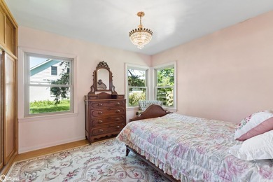 *The Pheasant House on Main* Step into timeless charm with this - photo 16