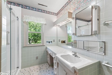 *The Pheasant House on Main* Step into timeless charm with this - photo 24