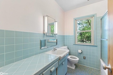 *The Pheasant House on Main* Step into timeless charm with this - photo 30