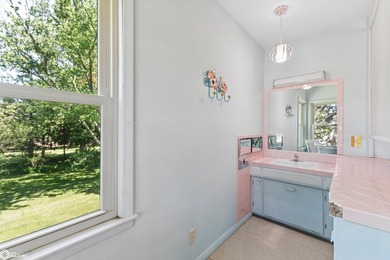 *The Pheasant House on Main* Step into timeless charm with this - photo 32
