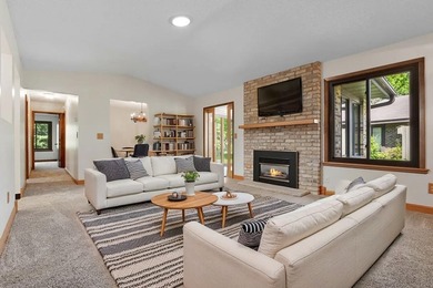 Welcome to 975 Yuma Lane N, featuring a bright four-season porch - photo 2