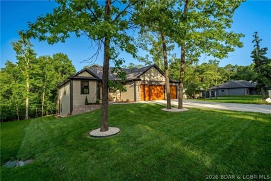 Welcome to luxury living in coveted Porto Cima, the Lake of the - photo 2