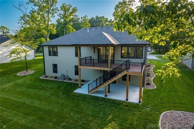 Welcome to luxury living in coveted Porto Cima, the Lake of the - photo 3
