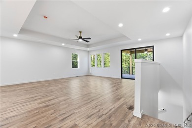 Welcome to luxury living in coveted Porto Cima, the Lake of the - photo 5