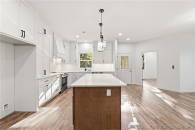 Welcome to luxury living in coveted Porto Cima, the Lake of the - photo 9