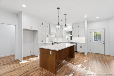Welcome to luxury living in coveted Porto Cima, the Lake of the - photo 10