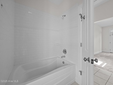 Coastal Comfort in Dolphin's Ridge - Custom-Built & Close to the