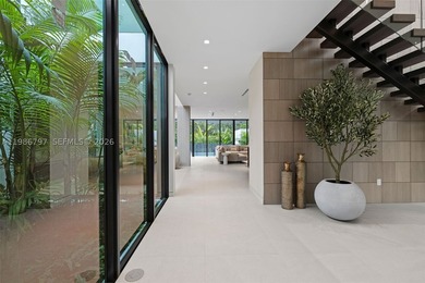 Welcome to the Modani Residence, a showcase of modern design and - photo 3