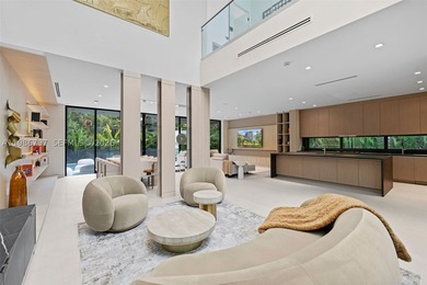Welcome to the Modani Residence, a showcase of modern design and - photo 5