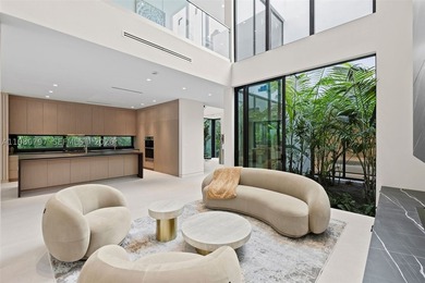 Welcome to the Modani Residence, a showcase of modern design and - photo 6