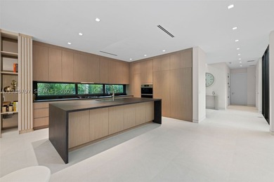 Welcome to the Modani Residence, a showcase of modern design and - photo 7