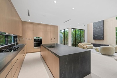 Welcome to the Modani Residence, a showcase of modern design and - photo 8