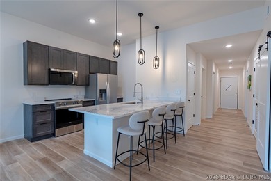 Enjoy the perfect blend of elevation and convenience in this - photo 6