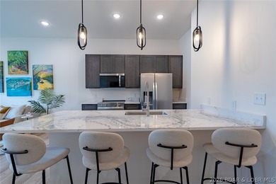 Enjoy the perfect blend of elevation and convenience in this - photo 7