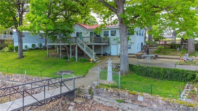 Peaceful lakefront living awaits. Tucked inside a protected - photo 1