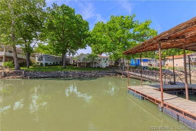 Peaceful lakefront living awaits. Tucked inside a protected - photo 3