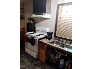 Price Drop on Two Homes/80ac with a large pond, Barns & More! If