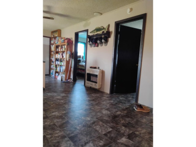 Price Drop on Two Homes/80ac with a large pond, Barns & More! If