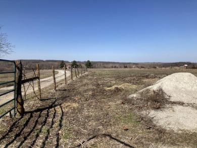 Price Drop on Two Homes/80ac with a large pond, Barns & More! If