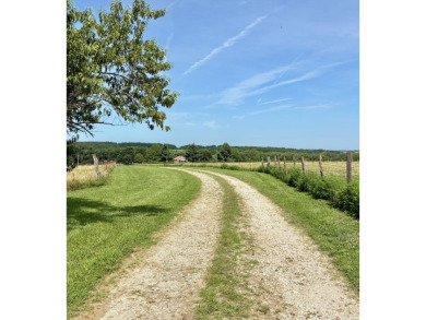 Price Drop on Two Homes/80ac with a large pond, Barns & More! If