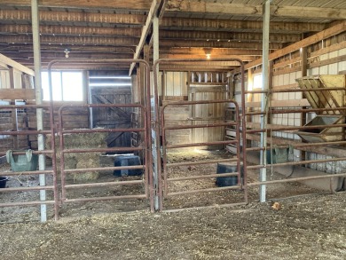 Price Drop on Two Homes/80ac with a large pond, Barns & More! If