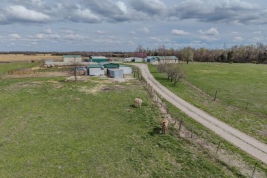 Price Drop on Two Homes/80ac with a large pond, Barns & More! If