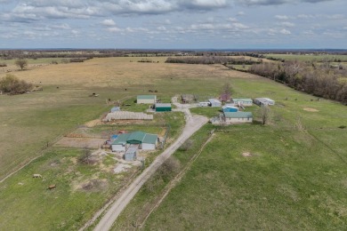 Price Drop on Two Homes/80ac with a large pond, Barns & More! If